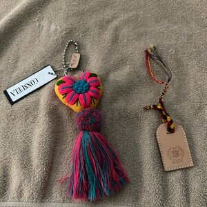 Consuela keychain and name tag new condition